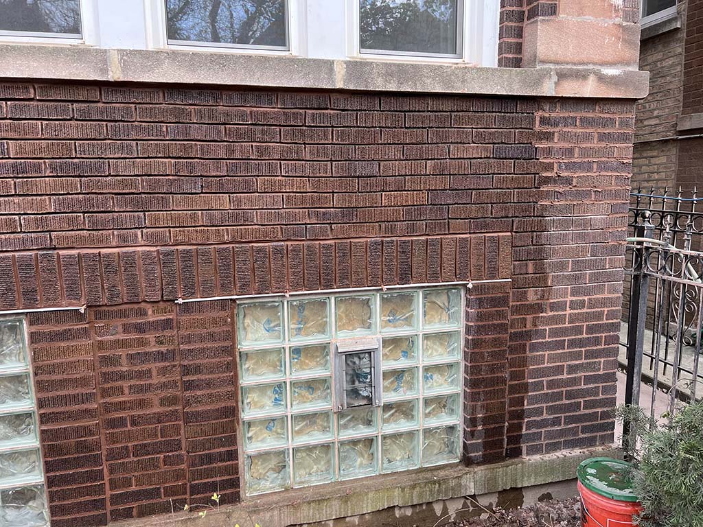 brick wall and glass window blocks chicago tuckpointing