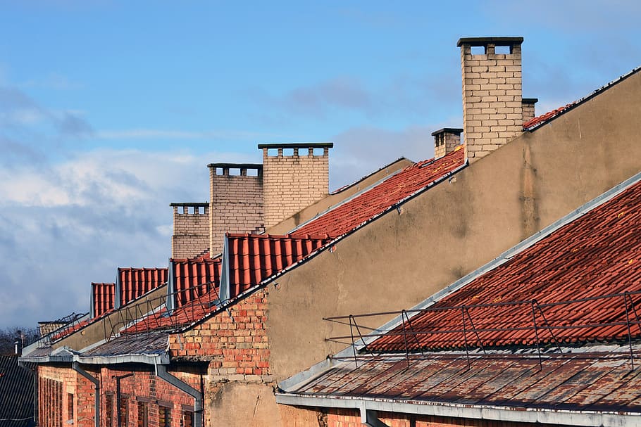 multiple brick chimneys next to each other chimney repointing